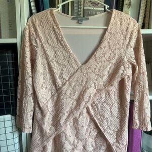 Pink lace blouse with faux wrap design